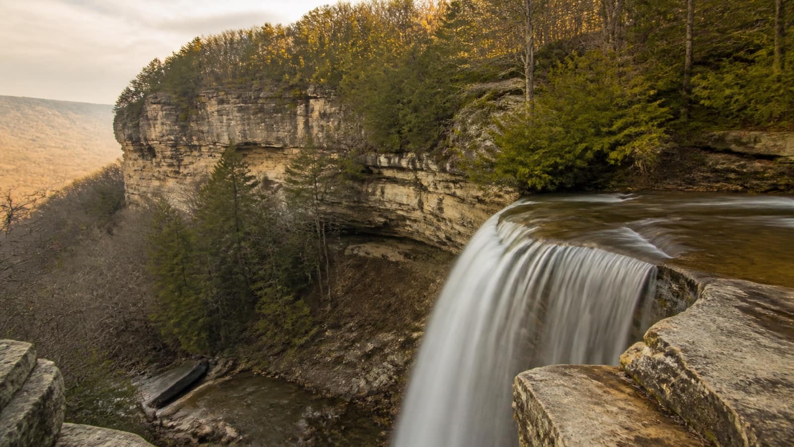 Waterfall flowing over a sandstone ledge in northeast Alabama's Lookout Mountain region